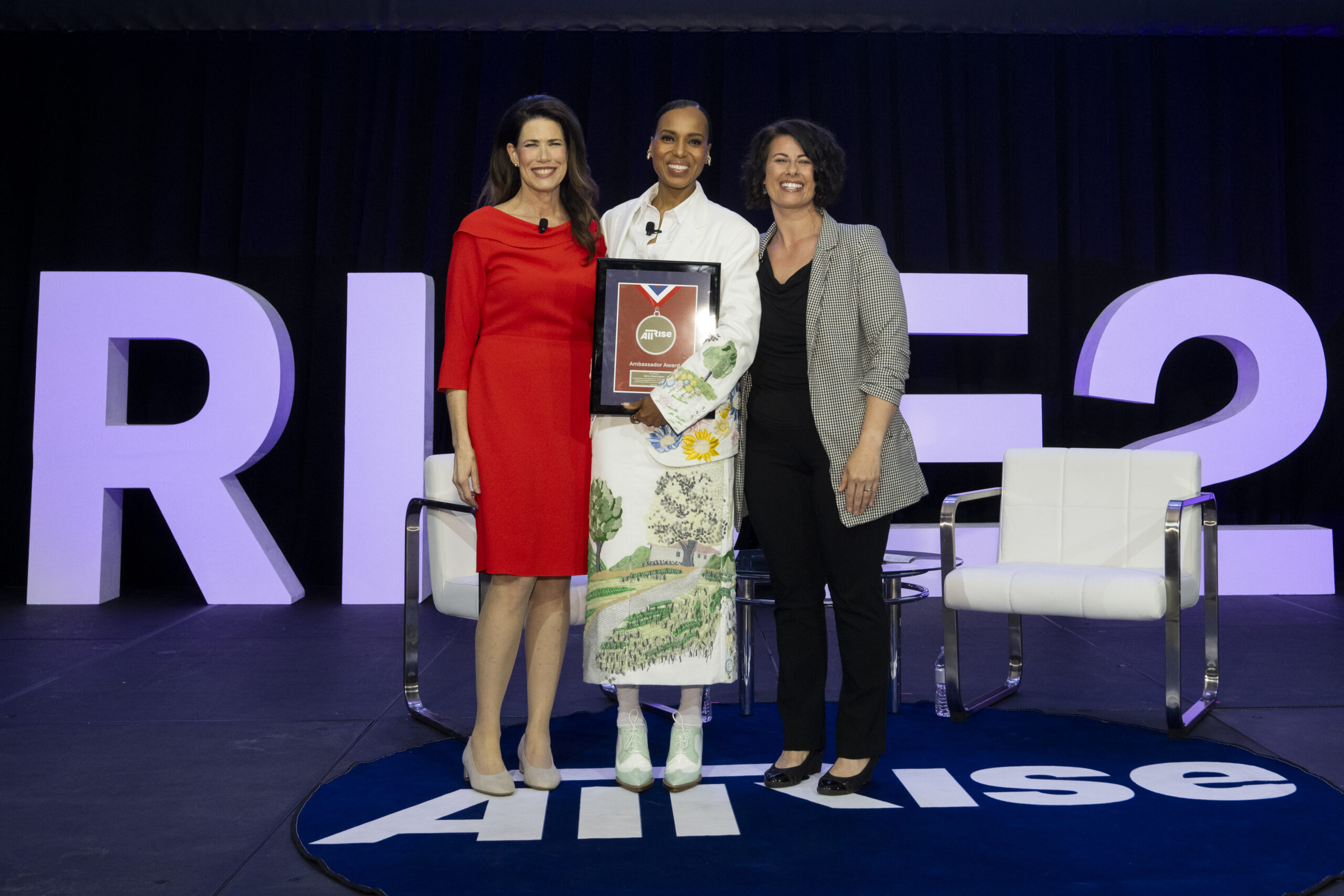 Kerry Washington, center, is presented with the All Rise Ambassador Award by All Rise director of strategic engagement Melissa Fitzgerald, left, and All Rise board of directors member Abby Frutchey.