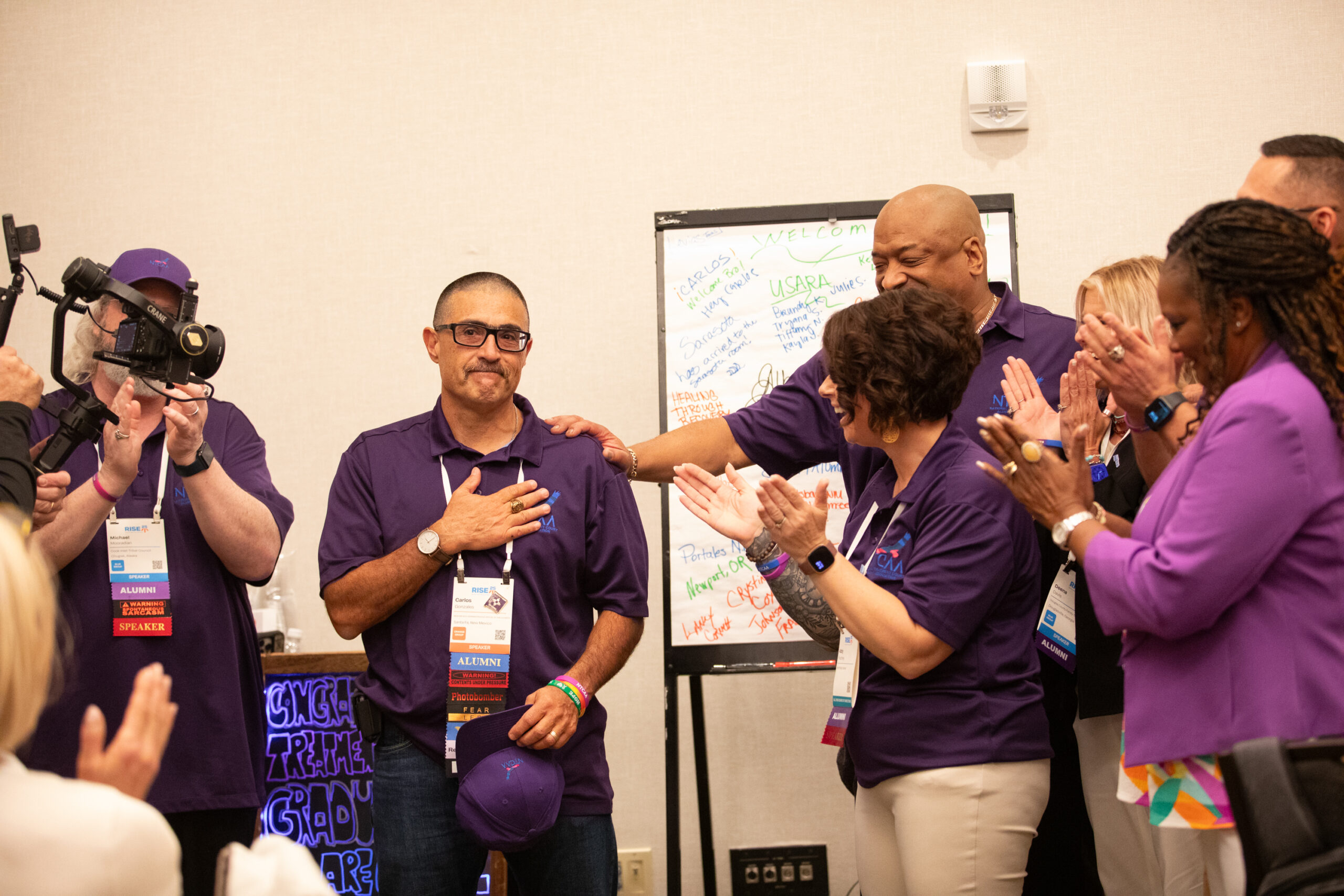 National Treatment Court Alumni Association board chair Carlos Gonzales is honored for his tireless dedication to expanding alumni outreach across the country.